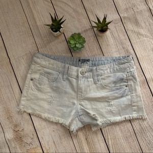 Blue and white distressed striped shorts